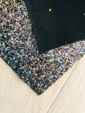 Black and Gold Chunky Glitter Fabric - Black Twill Backing