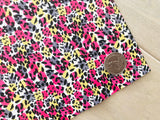 Custom Printed Smooth Faux Leather with a Leopard Design