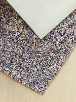 Mixed White, Gold, Black and Purple Chunky Glitter Fabric