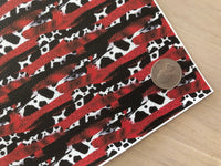 Custom Printed Pebbled Faux Leather Cow Print and Red Brushstroke Design